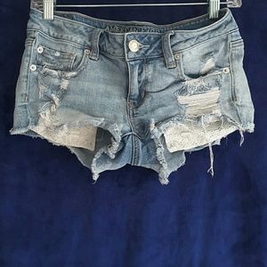 American Eagle stretch size 4 distressed shorts